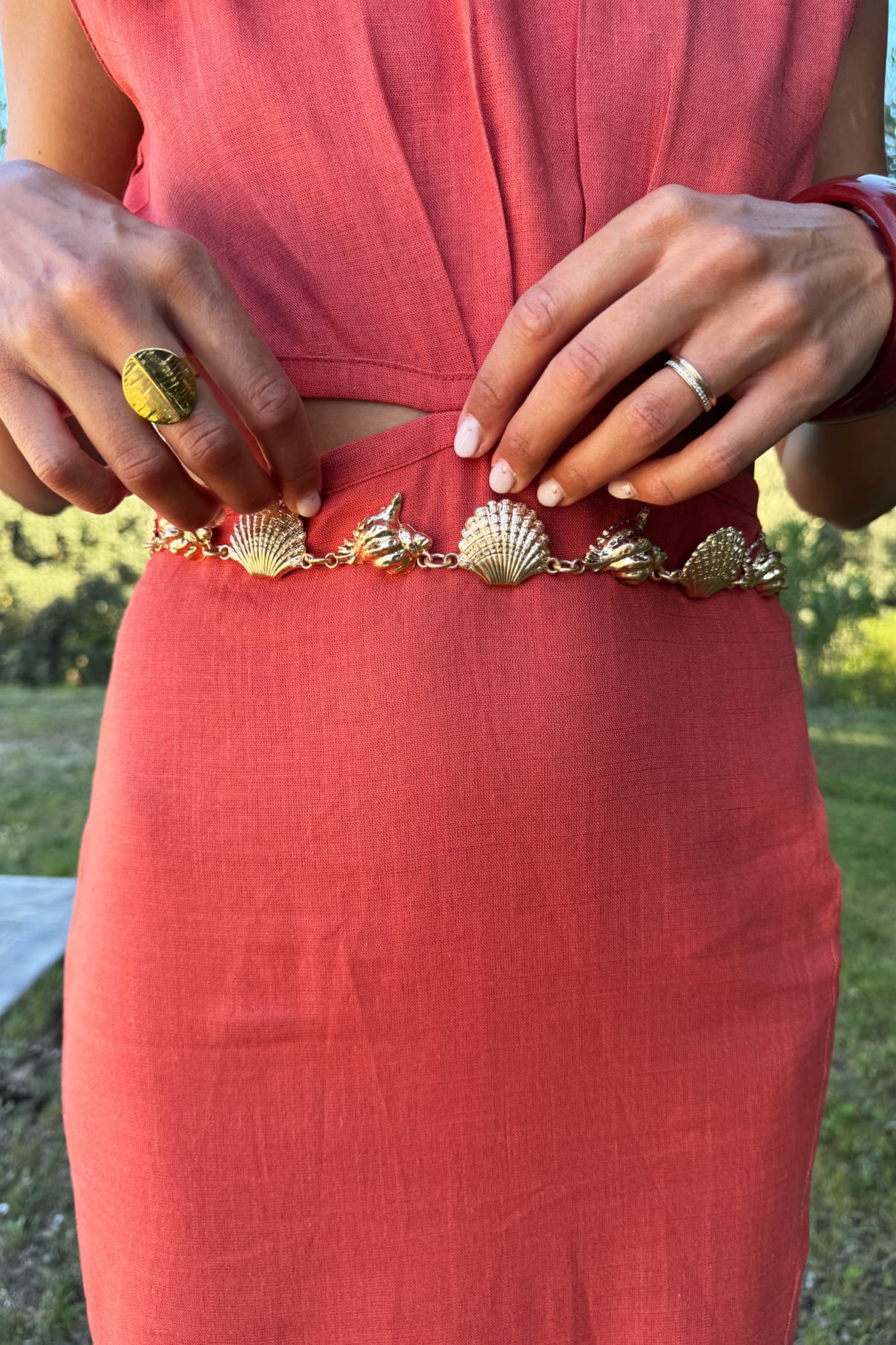 Cinturón de cadena con conchas